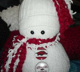 sock snowmen or snow babies as i like to call them, This one I made for my husband as he is a fan of the Razorbacks The buttons are specialty buttons I found on Etsy