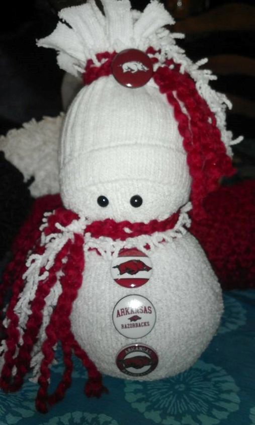 sock snowmen or snow babies as i like to call them, This one I made for my husband as he is a fan of the Razorbacks The buttons are specialty buttons I found on Etsy