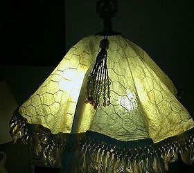 chicken wire frame lamp shade, crafts, repurposing upcycling, The ambiance is so cozy warm and inviting Once you place your chicken wire shade on you will need to adjust it with your fist to make it rounder