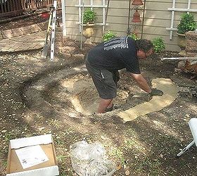 building a backyard pond, outdoor living, ponds water features, Added sand for cushion between rock soil and liner