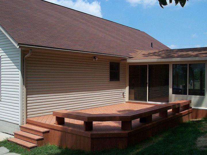 composite decks, decks, A composite deck with a bench next to a new patio room