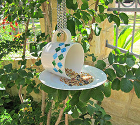 whimsical bird feeder, gardening, outdoor living, repurposing upcycling, This is what it looks like with bird seed in it If it s windy where you live you could glue this to a post to make it more stable