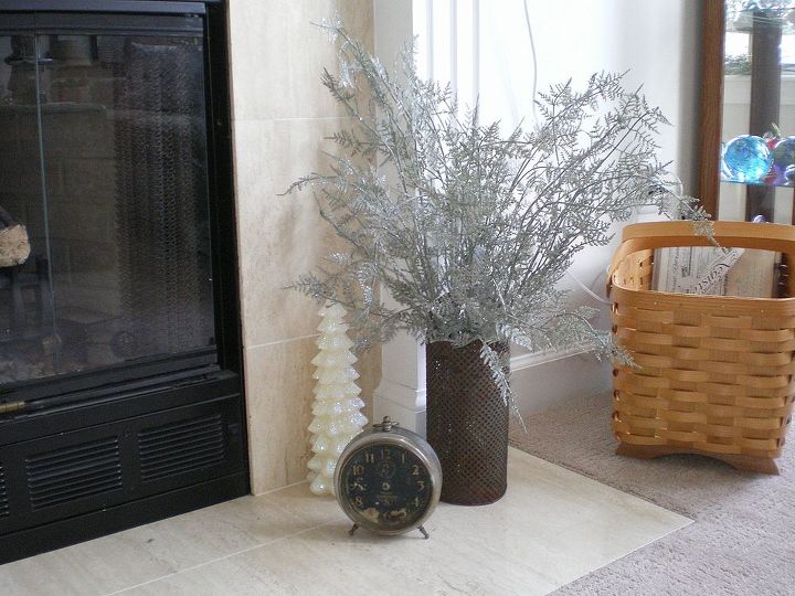 using vintage items in winter decor, christmas decorations, repurposing upcycling, seasonal holiday d cor, An old rusty grater with winter greens stuck in