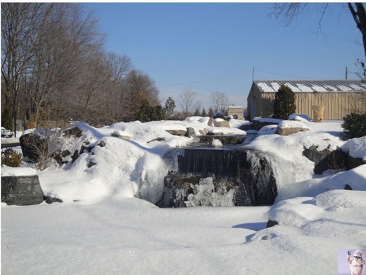 winter waterscapes, outdoor living, ponds water features, Waterfall Peaking Out of a Snowbank