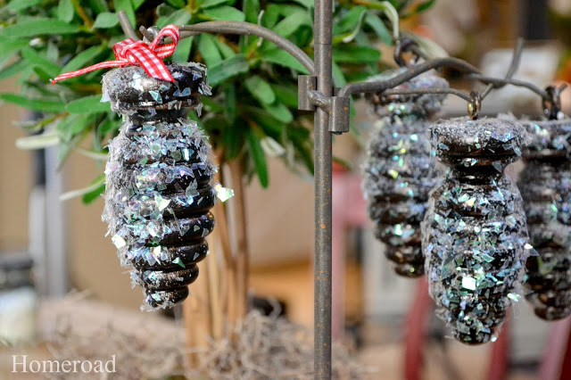 wooden glittered pinecones, crafts, repurposing upcycling, seasonal holiday decor, Glitter paint snow and glue turn them into gorgeous pinecones