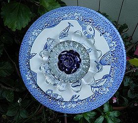 finally started making my plate flowers and glass towers what fun, Just finished this pretty blue flower plate love it