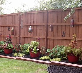 outdoor landscape, fences, gardening, landscape, outdoor living, After Backyard Fence w Lanterns Red Pots