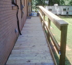 this is one ramp built by our brotherhood for one of our elder members, curb appeal, diy, woodworking projects, Handrails are 42 high made from a 2x6 on top with 2x4 mounted under it to give 6 wide top and 6 high cap