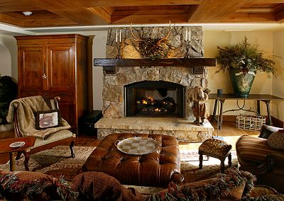 real stone fireplace should it stay or should it go i can t decide, fireplaces mantels, home decor, living room ideas, I found this picture on Houzz com and I love the updated stone and mantel Can I add a mantel and get close to this look Should I color the stone in the tan family So confused