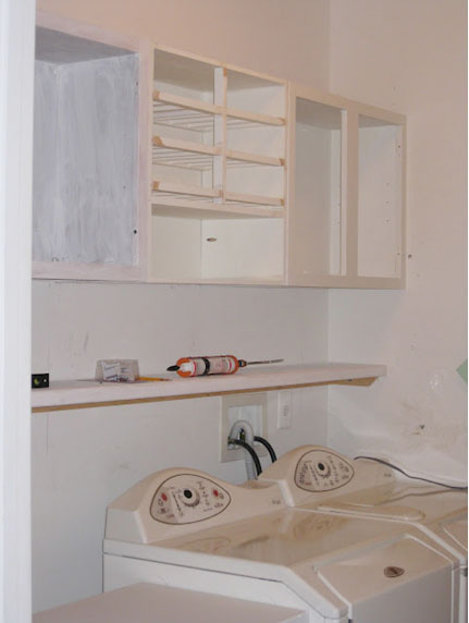 cabinets heightened to the ceiling, kitchen cabinets, laundry rooms, The way they look before