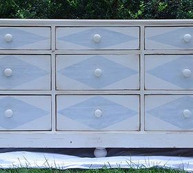 painted dresser with harlequin diamonds and compass roses, painted furniture, A straight on shot of the painted dresser Antique white base with pale blue diamonds The drawers were simple with no embellishments and plain wooden knobs so the diamonds worked they had no competition