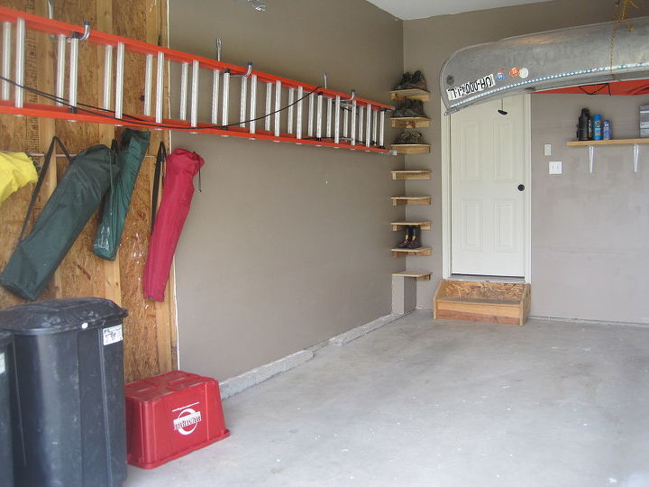 garage storage, cleaning tips, doors, garages, shelving ideas, storage ideas, Shelves for muddy shoes were built to the left of the laundry room door These were made by cutting wood to form braces nailing them into the wall then nailing a shelf into the braces