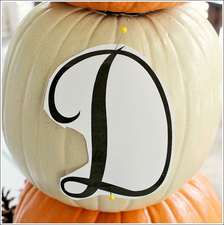 pumpkin topiary fall decorating ideas, container gardening, crafts, gardening, seasonal holiday decor, To add a monogram to your pumpkin print out a letter and use a few stick pins to hold it in place Take another stick pin and gentle poke small holes following the lines of your letter
