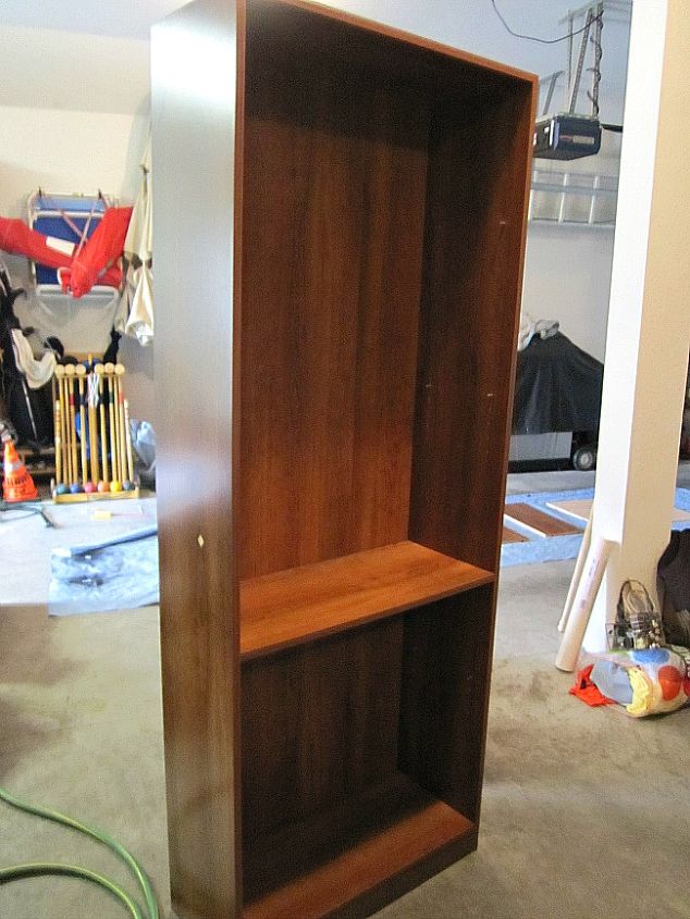 save on space by turning a bookcase into a desk here s how, painted furniture, repurposing upcycling, Bookcase Before The shelf you see stayed in place so that the wood for the desk piece could be attached