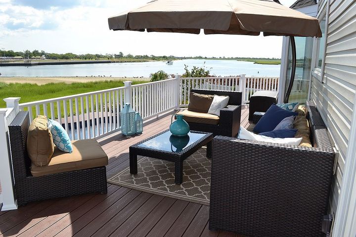 the deck and patio company replaces pool deck after hurricane sandy, curb appeal, decks, outdoor living, patio, Deck and Patio s design brought the deck up to the back door Stepping out onto tits first tier the homeowners enjoy a deep seating lounge area that boasts panoramic views of the bay s inlet