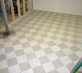 Checkerboard painted concrete basement floor in new craft room I'm building.