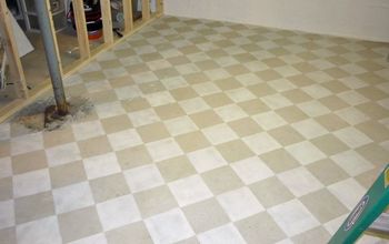 Checkerboard painted concrete basement floor in new craft room I'm building.