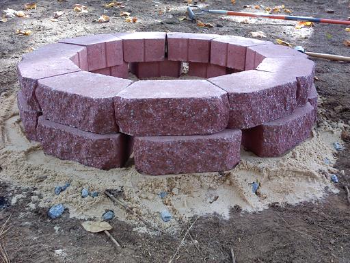 brick backyard firepit, bottom row is spaced to allow airflow