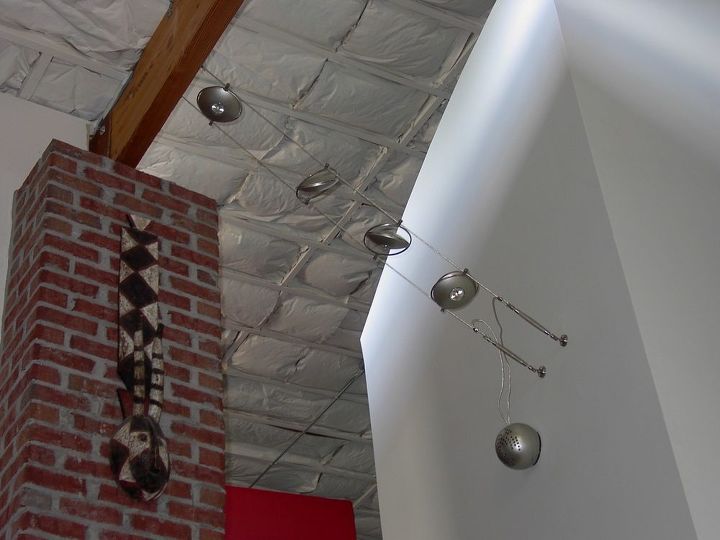 replaced existing wall mounted fixture with suspended low wattage spot fights, View from below