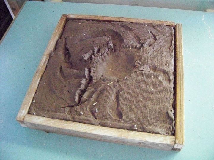 how to build an art mold out of everyday products, crafts, In this case I used a crab which I pre froze before pressing into the re rolled clay I use a rolling pin Once in the mold I cut the outside edges to place the sticks that will hold the plaster in place