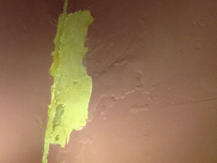 our house built in 1902 multiple moisture problems need fixing, Further away picture Plaster walls more open spot is chimney under which may be concrete unsure