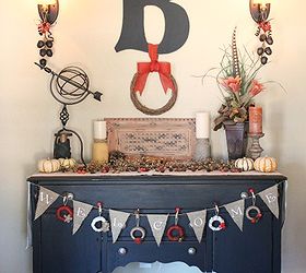 decorating for fall, seasonal holiday d cor, wreaths, Our entryway buffet all dressed up for Fall My favorite part is the garland made with mini wreaths I made from Ball jar lids