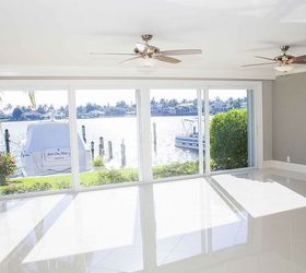 gulfshore condo remodel, home improvement, kitchen backsplash, kitchen design, kitchen island, New glass walls and high end tile floors opened up this condo into a dock front paradise