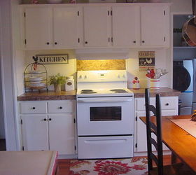 kitchen makeover, home decor, kitchen design, Painting the cabinets white made the stove just blend in love it