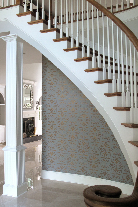 paint or wallpaper yes this project is painted there are many advantages to, home decor, painting, Transforming this wall with paint draws attention to the graceful curves of the staircase
