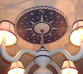 jewelry for the fifth wall, home decor, lighting, It s all in the details when decorating In this Nautical Themed Nursery a client chose my Compass Ceiling Medallion to complete the look Shown in distressed navy Cast in lightweight resin from my hand carved original