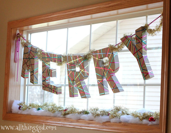 metallic ribbon wrapped holiday letters, seasonal holiday decor, I used a staple gun to staple a long strand of beads to the back of the letters to hang them in the window I love how they catch the light and show off all throughout the day