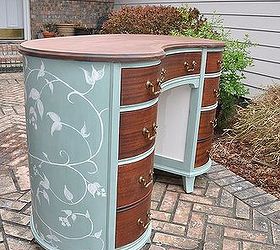 painted mahogany kidney shaped desk, painted furniture, I thought it was nice to put a lighter color on the inside panels that was you can really see the detail of the trim
