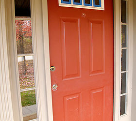 front door redo using faux wood grain technique, I started with this red fiberglass door with white trim