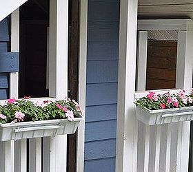 flower boxes for the playhouse, flowers, gardening, outdoor living, The flower boxes easily slid into their brackets and now frame the door into the play house