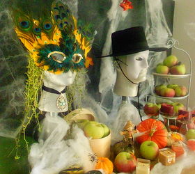 fall decor and a masquerade, seasonal holiday d cor, I brought in my foam garden heads and decorated them with some masks for the fall season