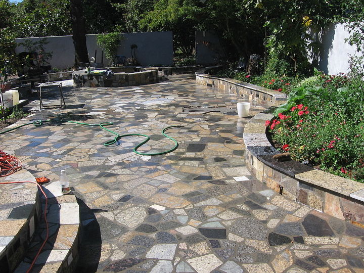 patio walkway and wall in stone brick block and granite, concrete masonry, ponds water features, porches, Why not just cover that ugly old concrete slab or cracked walkway and save yourself a ton of money which you could spend on plants or new outdoor furniture to dress it up