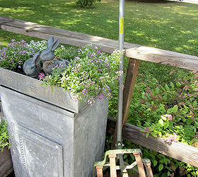 vintage garden farm tools are perfect for a junk garden, flowers, gardening, Lean your tools up against a deck rail