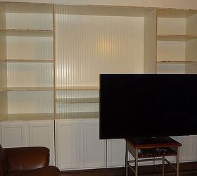 custom built entertainment center, Shelving completed Old school desk became our entertainment center for awhile