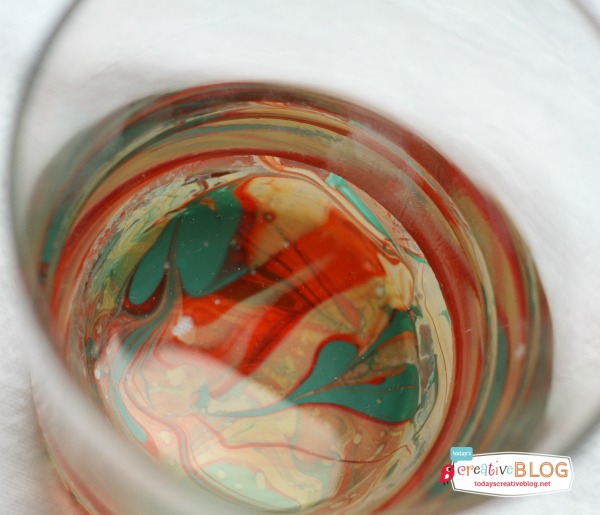 diy marbled glassware with nail polish, crafts, repurposing upcycling, Looking into the glass you see a beautiful marbled design