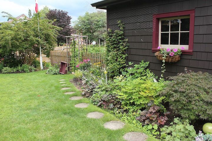 mid summer garden tour, flowers, gardening, perennials, raised garden beds, The garage garden is home to a cherished Japanese maple an old clematis and a couple huge bleeding hearts giving it a cottage charm