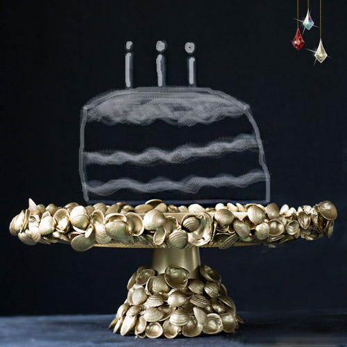 making a fabulous cake platter with shells hot glue and gold paint, crafts, A cake stand covered in golden shells is a step above the norm