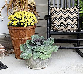 fun and festive fall porch, curb appeal, gardening, outdoor living, seasonal holiday decor, wreaths, Tall bushel baskets and old buckets hold the fall mums and cabbage kale