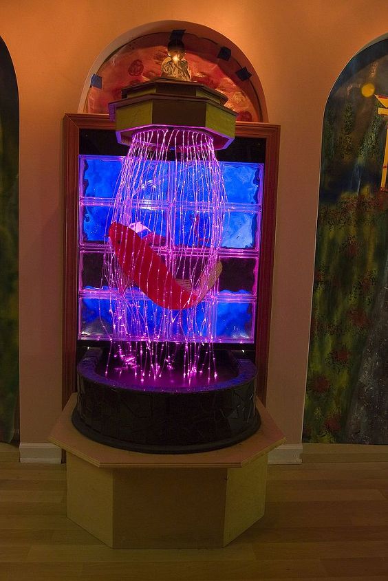the water feature in my living room was created and designed using fiber optic, home decor, lighting, WATER FLOWS DOWN EVERY STRAND OF FIBER AND CHANGES 8 DIFFERENT COLORS THAT GLITTER WHEN THE WATER STREAMS DOWN