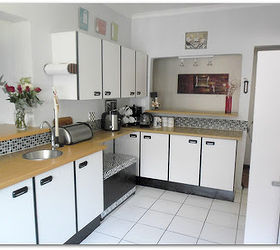 kitchen make over the budget friendly way, countertops, home decor, kitchen design, tiling, A larger view a small kitchen looks bigger instantly if you break an opening into the passage tried tested and love it