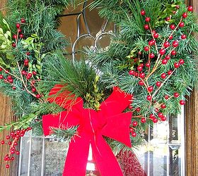 join me out on the front porch to see my outdoor christmas decor, outdoor living, porches, seasonal holiday decor, wreaths, A flimsy faux wreath is brought to life with lots of fluffing and tufts of fresh boxwood and pine boughs