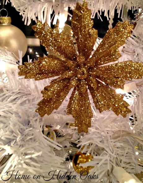 a winter white christmas tree, christmas decorations, seasonal holiday decor