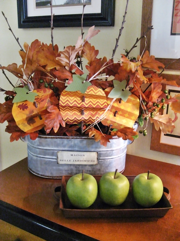 fun easy and inexpensive pleated paper pumpkins, crafts, seasonal holiday decor, Love the way they look added to all florals