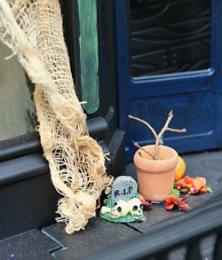 easy halloween decoration to make, crafts, halloween decorations, seasonal holiday decor, I added little decorations that I found at the craft store I found most of my decorations in the miniature doll house aisle