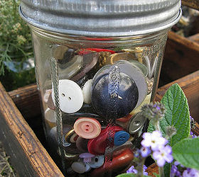 toolboxes are really for flowers didn t you know, flowers, gardening, repurposing upcycling, It s also fun to throw a few quirky things in the mix such as a jar full of buttons Why not