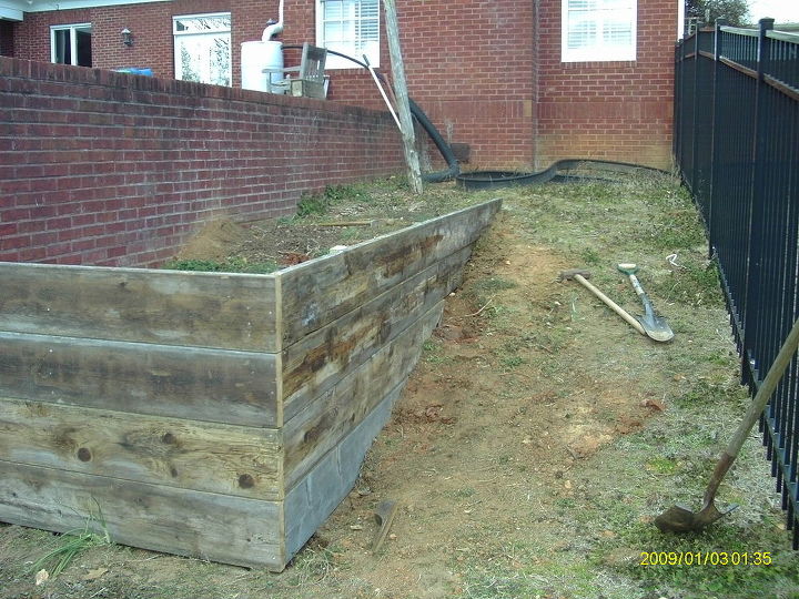 i put in a raised bed the post are pressure treated 4 x 4 s and the boards are, gardening, raised garden beds
